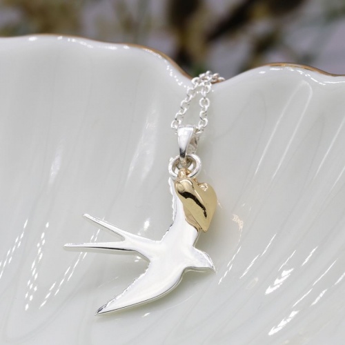 Silver Plated Swallow Necklace With Golden Star by Peace of Mind